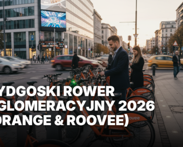 Pomarańczowe rowery Roovee - Bydgoski Rower Aglomeracyjny 2026 w Bydgoszczy. Ludzie odblokowują rowery miejskie aplikacją przy ruchliwym skrzyżowaniu.